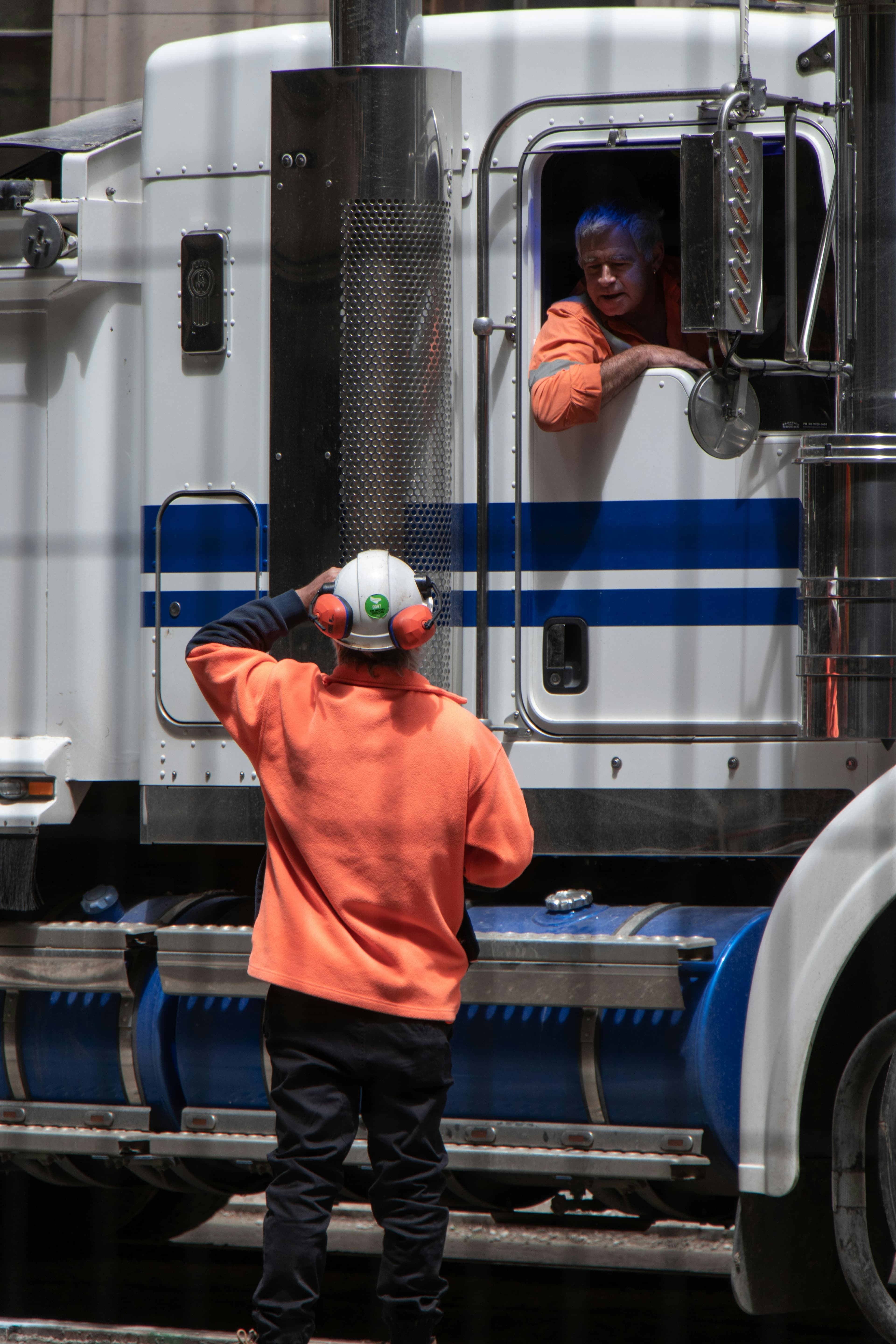 Driver at the cab of a truck